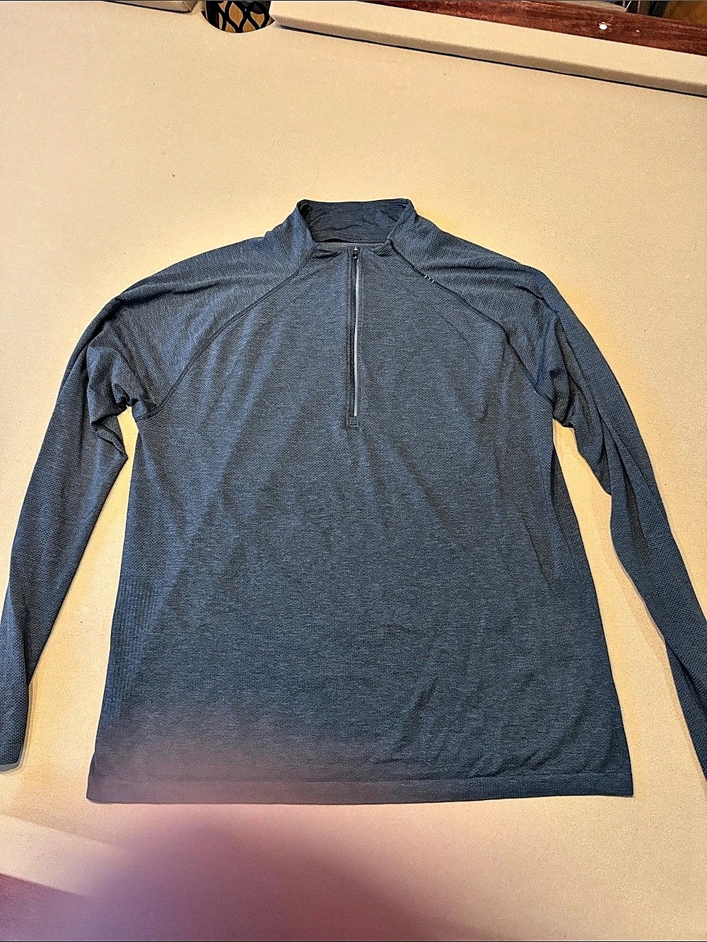 Lululemon men’s long-sleeve performance half-zip pullover in a versatile heather